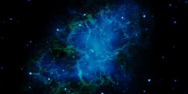 Blue and green irregular-shaped region of diffused light