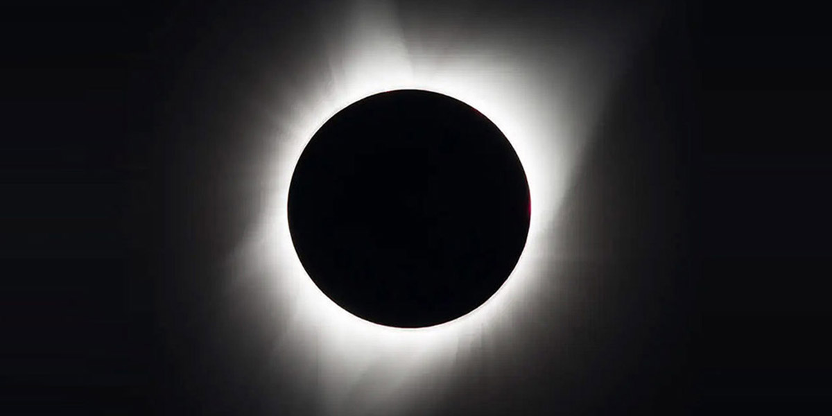 Total Solar Eclipse Illustration depicted by bright white flares surrounding a black circular object