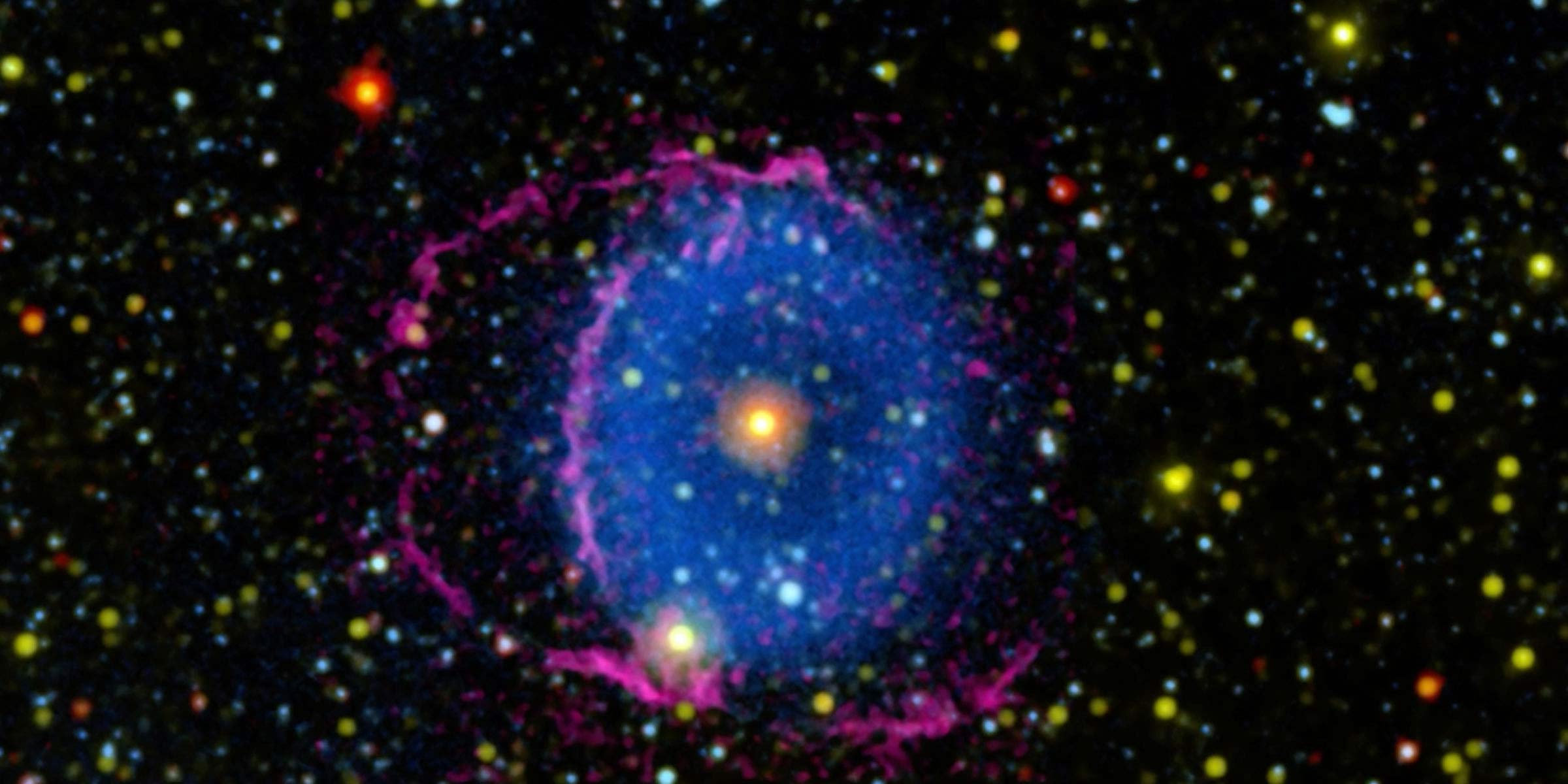 Blue Ring Nebula ejecting gas into space that radiates in far-ultraviolet light.