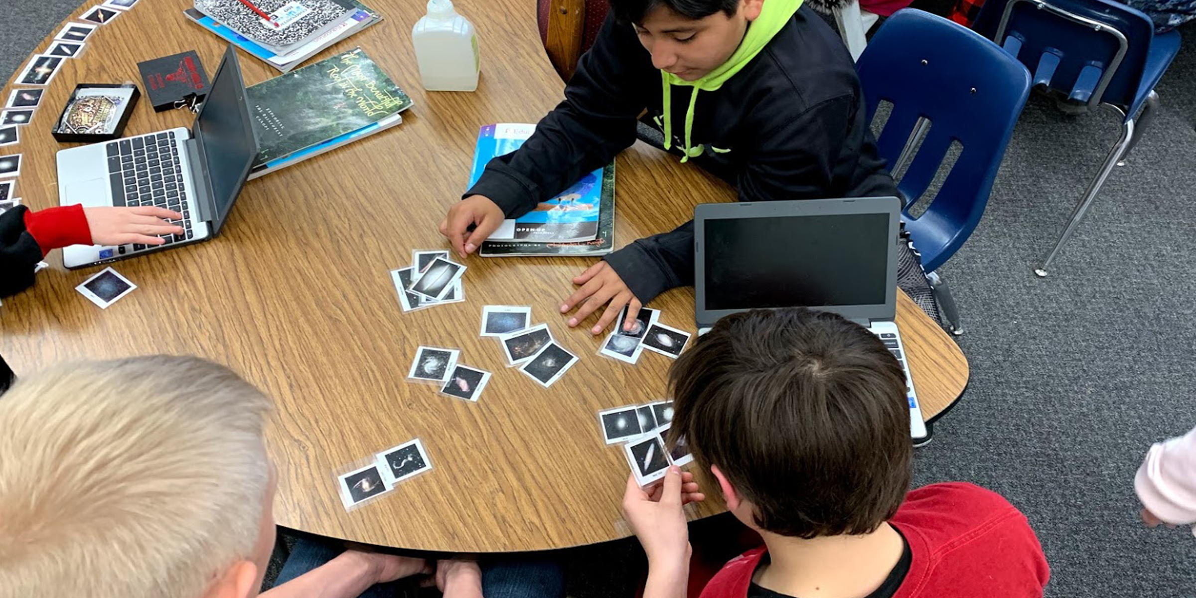 Students participate in a hands-on activity identifying galaxy types