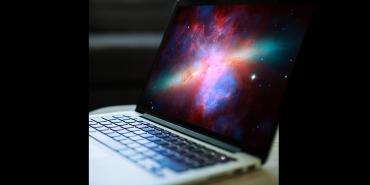 Website displayed on a laptop