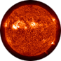 A reddish-orange image of the roiling surface of the Sun covered with solar prominences and variations in brightness.