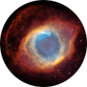 An eye-shaped cloud of gas a dust. The center is a blue bowl surrounded by yellow and orange clouds. A tiny white spot lies at the very center of it all.